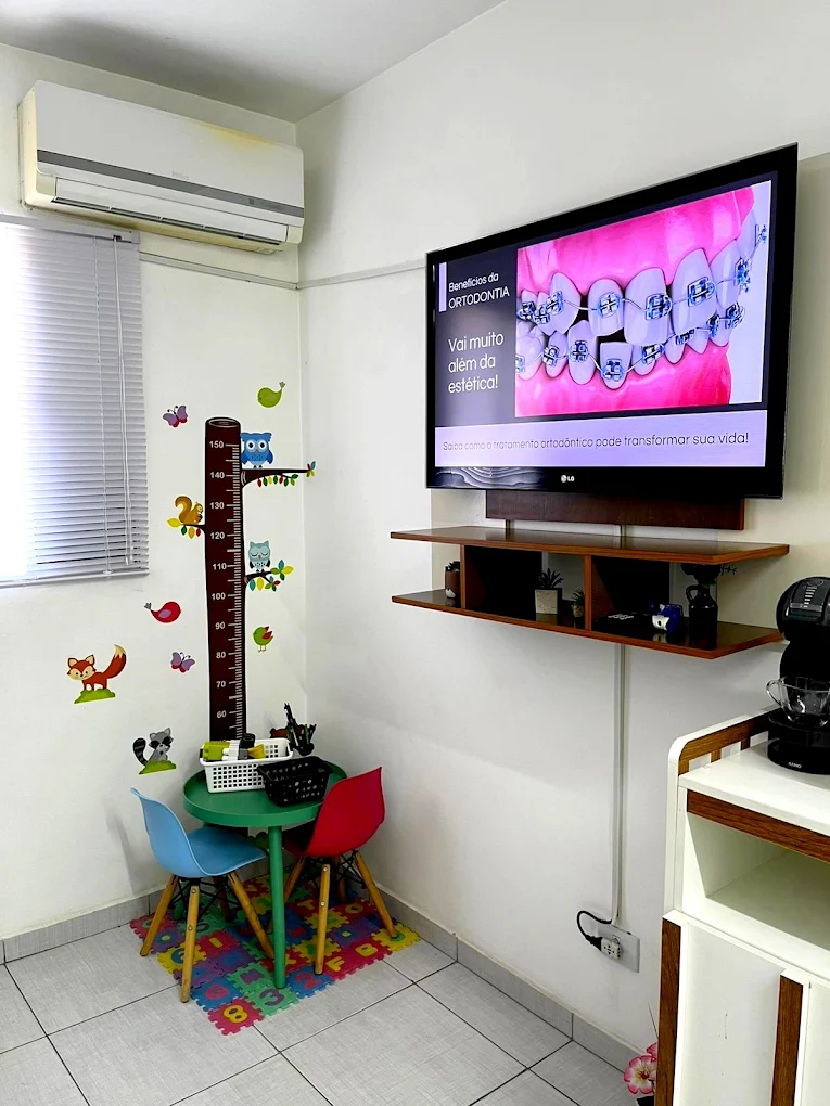 Espaço de espera com canto infantil